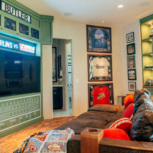 Exemple d'une salle de cinéma chic de taille moyenne et fermée avec un mur gris, un sol en brique et un téléviseur encastré.