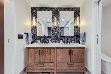 Inspiration for a mid-sized modern master double-sink and wallpaper bathroom remodel in Denver with flat-panel cabinets, medium tone wood cabinets, a bidet, quartz countertops, white countertops and a freestanding vanity