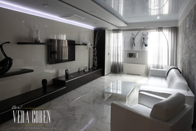 Diseño de salón para visitas abierto contemporáneo de tamaño medio sin chimenea con paredes blancas, suelo de mármol, televisor colgado en la pared y suelo blanco