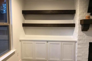 Fireplace builtins and mixed with rustic floating shelves