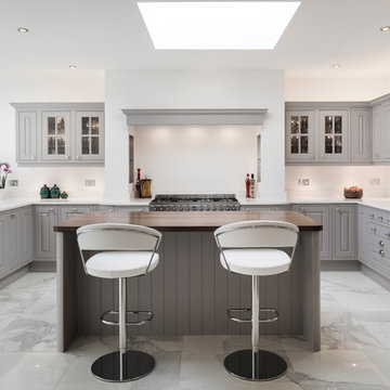 Upcycled grey kitchen with quartz and walnut surfaces