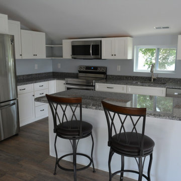Azul Platino Granite with White Icing Cabinetry