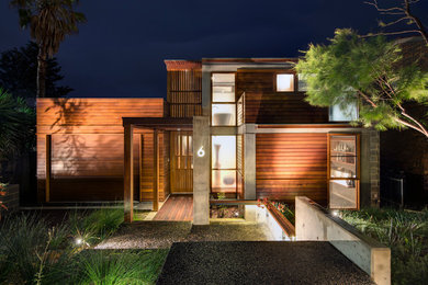 Contemporary wood flat roof idea in Sydney