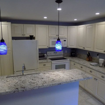 Eagle White granite with Cream Maple glazed cabinets