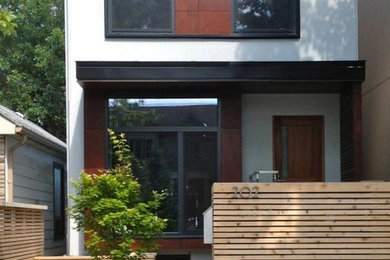 Example of a minimalist exterior home design in Toronto