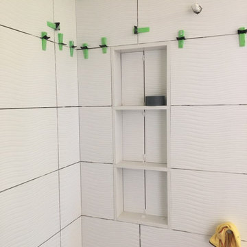 Tile continues