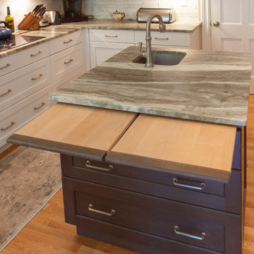 View of the Island with lots of extra storage, utility and seating for the prep