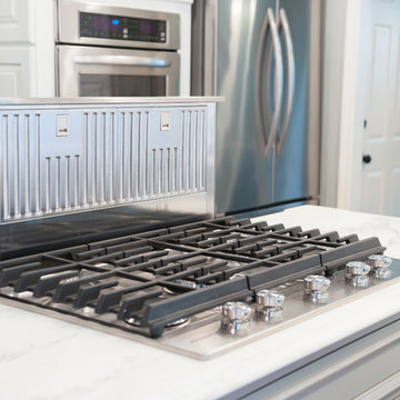 Downdraft vent system in transitional kitchen island