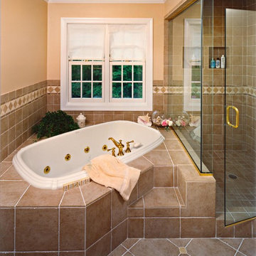 Elegant Tile Spa Bath with glass enclosed attached shower