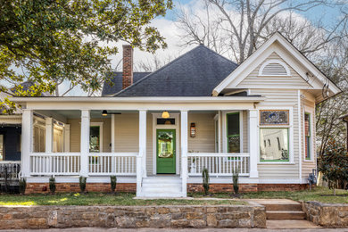 Mid-sized transitional beige exterior home photo in Atlanta with a shingle roof and a gray roof