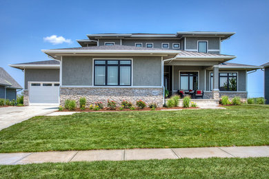 Large transitional gray two-story mixed siding exterior home idea in Other