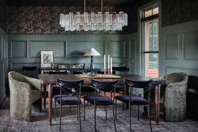 Example of a transitional wallpaper ceiling, wainscoting and wallpaper dining room design in Charlotte with multicolored walls