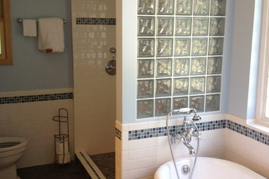 Inspiration for a mid-sized timeless master alcove shower remodel in Other with a one-piece toilet and blue walls