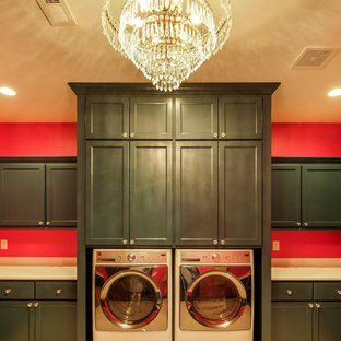 This is an example of an expansive rustic u-shaped separated utility room in Denver with recessed-panel cabinets, green cabinets, quartz worktops, pink walls, ceramic flooring and a side by side washer and dryer.