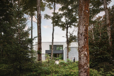Huge minimalist exterior home photo in Montreal