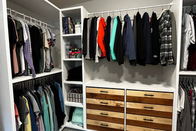 Inspiration for a mid-sized craftsman walk-in closet remodel in Atlanta
