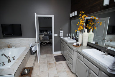 Drop-in bathtub - mid-sized transitional master beige tile and ceramic tile ceramic tile drop-in bathtub idea in Columbus with beaded inset cabinets, gray cabinets, gray walls, a drop-in sink and quartz countertops