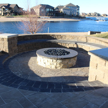 Elegant Fire Pit with Bench and Paver Patio