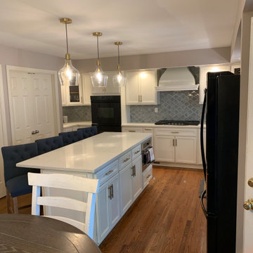 cabinet reface--white with quartz and tile splash, also removal of bulkhead