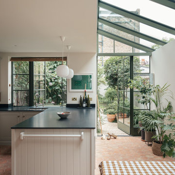 The Camberwell House - Kitchen and Dining area with glass roof to extension
