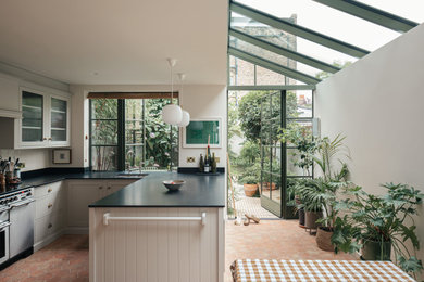 The Camberwell House - Kitchen and Dining area with glass roof to extension