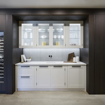 Ultra Contemporary Cabinetry with Hidden Traditional Kitchen Furniture