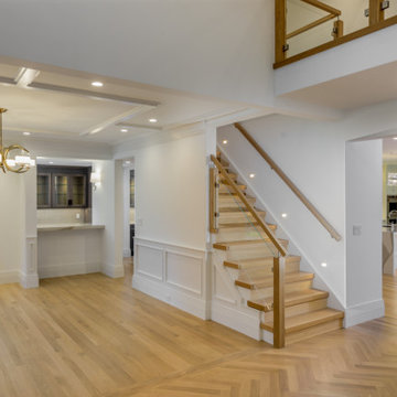 Custom White Oak Staircase with Starfire Tempered Glass Panels