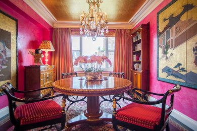 Elegant great room photo in New York with red walls