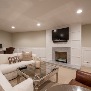 Photo of a large classic look-out basement in Philadelphia with beige walls, carpet, a standard fireplace, a wooden fireplace surround and beige floors.