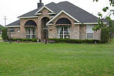 Example of a small classic beige one-story exterior home design in Dallas
