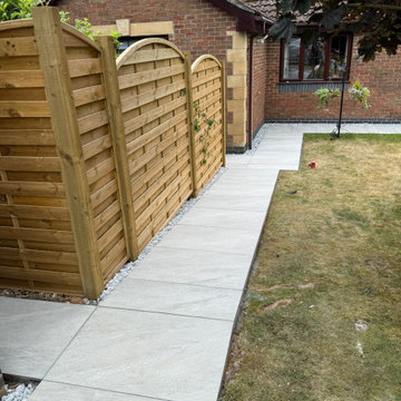 Porcelain Path Running Past Arched Top Screen Panels