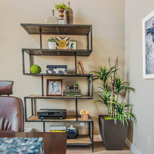 Medium sized modern study in Dallas with grey walls, ceramic flooring, no fireplace, a freestanding desk and brown floors.