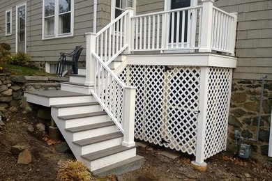 Backyard deck photo in Boston with no cover