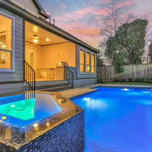 ヒューストンの中サイズの長方形トランジショナルスタイルのおしゃれなプール (コンクリート敷き	) の写真