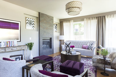 Mid-sized trendy formal and enclosed medium tone wood floor living room photo in Denver with beige walls, a standard fireplace and a brick fireplace