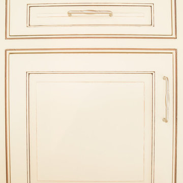 Cream Painted and Glazed Kitchen Cabinets