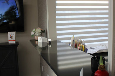 Inspiration for a vinyl floor and wallpaper home office remodel in Other