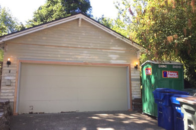 Inspiration for a mid-sized detached two-car carport remodel in Seattle