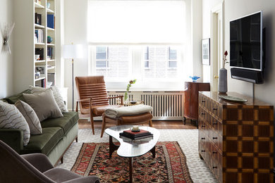 Inspiration for a mid-century modern family room remodel in New York