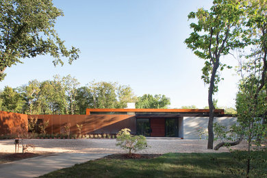 Example of a huge trendy one-story metal exterior home design in Kansas City