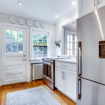 White Galley Kitchen with Hidden Toe Kick Drawers Washington DC