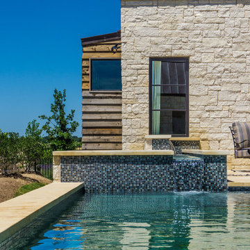 The Vineyard Farmhouse at Rough Hollow (Cedar Siding & Pine Soffit)
