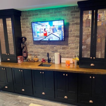 Basement Remodel with bar and game room
