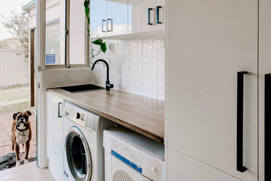 This is an example of a modern laundry room in Adelaide.