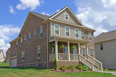 Example of a transitional exterior home design in Nashville
