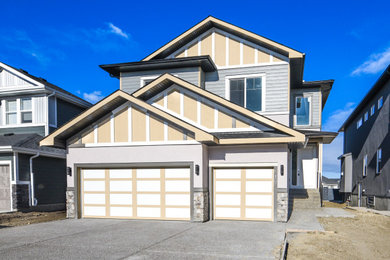 Example of an arts and crafts garage design in Calgary