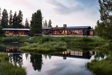 Rustic exterior home idea in Other