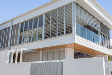 This is an example of a beach style exterior in Brisbane.