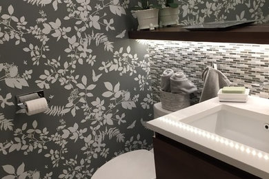 Bathroom - small contemporary white tile and marble tile marble floor bathroom idea in Ottawa with furniture-like cabinets, dark wood cabinets, a one-piece toilet, gray walls, an undermount sink and quartz countertops