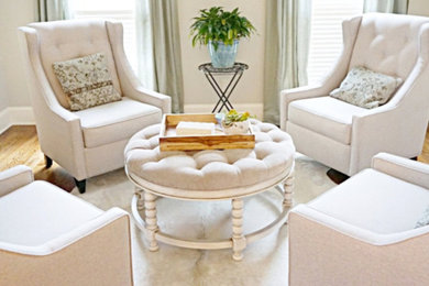 Inspiration for a small timeless enclosed medium tone wood floor and blue floor living room remodel in Charlotte with beige walls and no fireplace